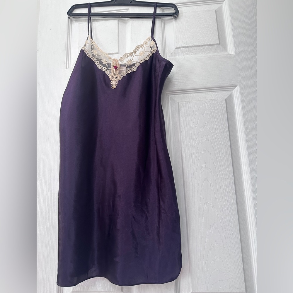 Like new satin like lingerie slip with exquisite lace trimming